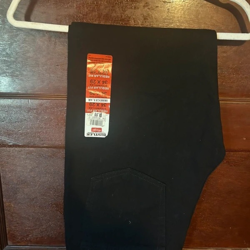 Rustler Black Pants with Red Brand Tag